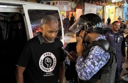 Malé City Mayor Dr Mohamed Muizzu being arrested from the PPM/PNC rally held in Malé on Tuesday, January 4, 2023. PHOTO: PPM