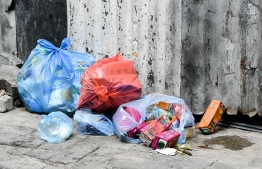 (FILE) Garbage bags left out on Malé streets, on January 4, 2023: even though the waste collection fee will be included in the electricity bill, households will not be required re-register with WAMCO for waste collection -- Photo: Nishan Ali/ Mihaaru