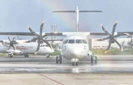 An earlier photo of Maldivian flights at the airport.
