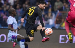 Paris Saint-Germain's Argentine forward Lionel Messi shoots to score the opening goal during the Riyadh Season Cup football match between the Riyadh All-Stars and Paris Saint-Germain at the King Fahd Stadium in Riyadh on January 19, 2023. -- Photo: Franck Fife / AFP