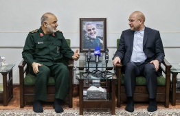 A handout picture provided by the Islamic Consultative Assembly News Agency (ICANA) on January 21, 2023, shows Iranian parliament speaker Mohammad Bagher Ghalibaf (R) meeting with the Islamic Revolutionary Guard Corps (IRGC) chief Hossein Salami, in the capital Tehran. - The IRGC warned the European Union against making a "mistake" by listing it as a terror group, after the bloc's parliament called for the measure. -- Photo Icana News Agency / AFP