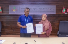 Ministry of National Planning, Housing and Infrastructure signed the contract with MTCC for the development of a causeway project linking five Laamu atoll islands-- Photo: Ministry of National Planning