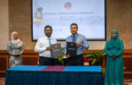 MACL Deputy Managing Director Thoha (L) and Youth Ministry State Minister Hussain Ismail  after signing the apprenticeship program agreement -- Photo: MACL
