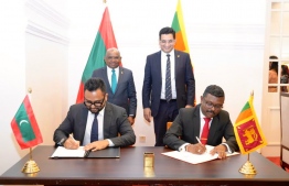 Maldives' Minister of Foreign Affairs Abdulla Shahid and Sri Lanka's Foreign Minister M.U.M. Ali Sabry observing the signing of the MoU. Photo: Ministry of Foreign Affairs