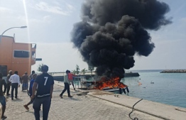 The speedboat that caught on fire in M. Dhiggaru harbour on 7th February 2023. Two people were severely injured in the incident --