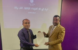 EC Vice President Ismail Habeeb hands over the registration of the newly formed Green Party of Maldives to Kaashidhoo MP Abdulla Jabir -- Photo: Election Commission