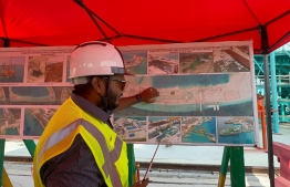 Project Manager Mohamed Jinan explains the progress of the Thiruvananthapuram Bridge