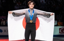Gold medallist Japan's Shoma Uno poses during the medal ceremony for the men's free skating during the ISU World Figure Skating Championships 2023 in Saitama on March 25, 2023. (Photo by Yuichi YAMAZAKI / AFP)