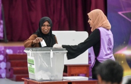 A Voter casting their ballot in Izzudhin School, Malé -- Photo: Nishan Ali