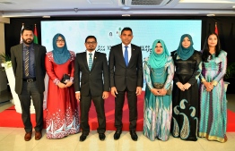 Former Vice President Faisal Naseem poses for a photo with the members of the Employment Tribunal during its 10th anniversary celebrations in 2019.