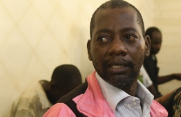 Self-proclaimed pastor Paul Nthenge Mackenzie, who set up the Good News International Church in 2003 and is accused of inciting cult followers to starve to death "to meet Jesus", appears at the Shanzu law courts in Mombasa on May 5, 2023. - A Kenyan cult leader accused of inciting and possibly forcing his followers to starve themselves to death appeared in court on May 5, 2023 in connection with the deaths of more than 100 people found buried in mass graves. -- Photo: Simon Maina / AFP