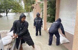 Addu City Council is providing support to affected residences including roof repairs, placing sand bag barriers to restrict flooding, and providing temporary shelter to the people in damaged residences-- Photo: Addu City Council
