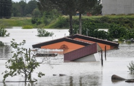 Flooded bungalows are pictured in Cesena on May 17, 2023 after heavy rains caused major floodings in central Italy. Trains were stopped and schools were closed in many towns while people were asked to leave the ground floors of their homes and to avoid going out, and five people have died after the floodings across Italy's northern Emilia Romagna region. -- Photo: Alessandro Serrano / AFP