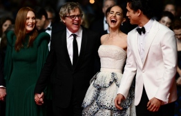 (From L) US actress Julianne Moore, US director Todd  Haynes, US-Israeli actress Natalie Portman and US actor Charles Melton arrive for the screening of the film "May December" during the 76th edition of the Cannes Film Festival in Cannes, southern France, on May 20, 2023. -- Photo: Chirstophe Simon / AFP