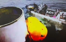 This handout photo taken on May 31, 2023 and provided by South Korean Defence Ministry in Seoul shows an object presumed to be part of North Korea's claimed 'Space Launch Vehicle' being salvaged by South Korea's miliaty in waters 200km (124 miles) west of Eocheong Island in the Yellow Sea. South Korea's military said on May 31, it had located and was salvaging a suspected part of a North Korean spy satellite that crashed into the sea shortly after launch due to a rocket failure. -- Photo by Handout / South Korean Defence Ministry / AFP