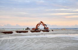 Land reclamation project ongoing at Addu atoll Maradhoo; local authorities have received multiple complaints of people taking sand from the reclaimed area-- Photo: President's Office