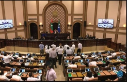 Ruling party members continued to protest following Parliament's decision to defer Attorney General Ibrahim Rifath's no-confidence motion--