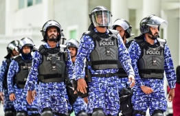 Police take part in an operation -- Photo: Nishan Ali