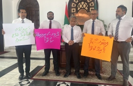 Opposition parliamentary group members protesting outside parliament on Tuesday, June 20, 2023 -- Photo: Mihaaru