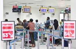 People waiting at the domestic flights counter on June 22, 2023: over double the normal number of flights were scheduled today for the holiday rush -- Photo: Nishan Ali / Mihaaru