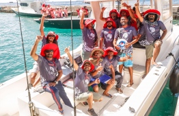 A team that participated in a previous “Ooredoo Mas Race” Fishing Competition  -- Photo: Ooredoo