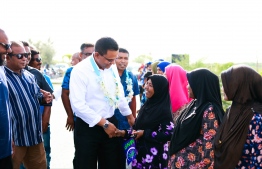MNP's President Mohamed Nazim greeting citizens of Kulhudhufushi on July 7, 2023