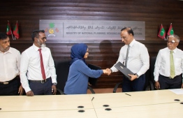 Maldives government signs with Capital Marine and Construction for the land reclamation in three islands to develop regional airports-- Photo: Ministry of National Planning