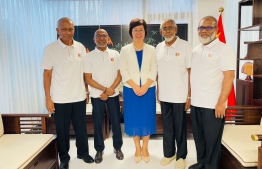 The first Maldivian team to compete in an international sports tournament: Some of the players of the national table tennis team; from right to left: Hassan Latheef Moosa, Huraa Abdul Sattar, Seaweed Ahmed Latheef and Hussain Habeeb posing for a photo with the Chinese Ambassador to the Maldives Wang Lixin