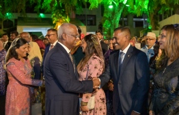 President Solih greets Prosecutor General Hussain Shameem at the Independence Day reception -- Photo: President's Office