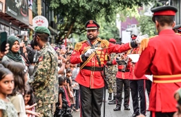 Maldives' military's brass band during the parade held on Thursday, July 27, 2023 to celebrate Independence Day, as the crowd watches on -- Photo: Nishan Ali / Mihaaru