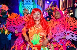A group of women employed by f MPL, who were part of this year's float procession, dressed to show the underwater beauty of Maldives -- Photo: Nishan Ali / Mihaaru