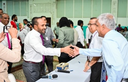 Abdulla Yameen's running mate, Dr. Mohamed Jameel Ahmed greets the members of the Elections Commission after the submission of forms -- Photo: Nishan Ali