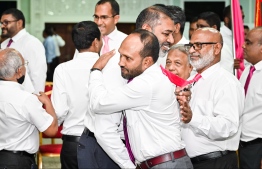 Yameen's running mate Dr. Jameel hugs and shakes hands of PPM members after submitting the candidacy form-- Photo: Nishan Ali | Mihaaru