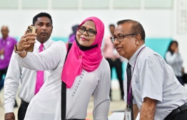 A PPM supporter stops by to take a selfie with EC's President-- Photo: Fayaz Moosa