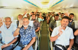 PNC candidate Dr. Mohamed Muizzu (L) with the party's president Abdul Raheem (C) and running mate Hussain Mohamed Latheef (R) along with PPM/PNC coalition's leadership members-- Photo: PPM