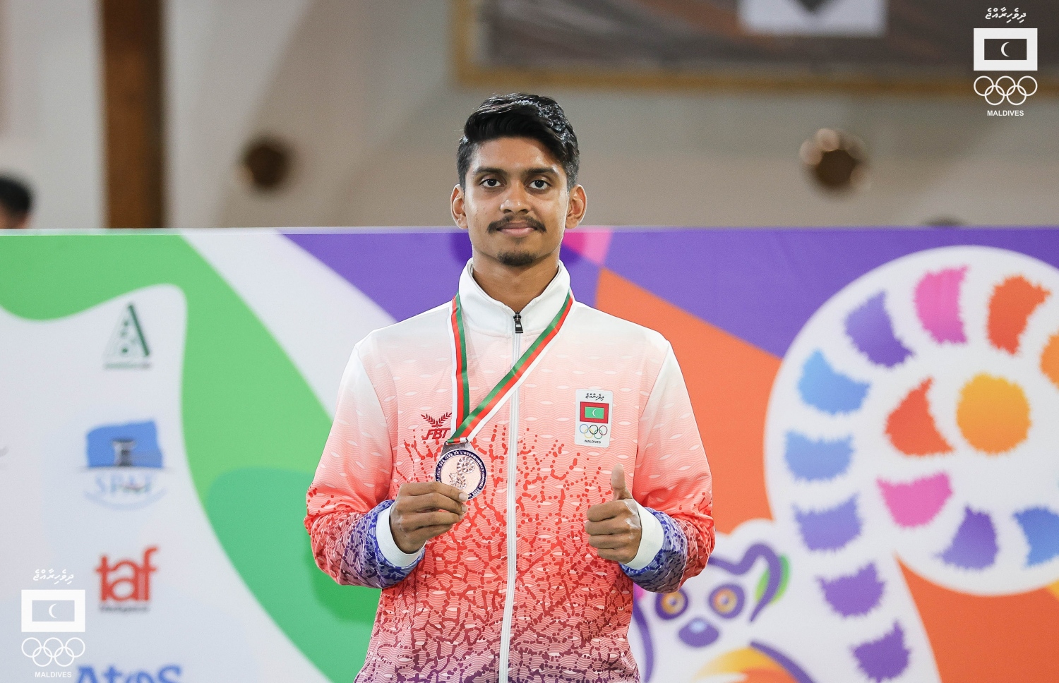 ބެޑްމިންޓަން ފިރިހެން ސިންގަލްސް އިވެންޓުން ބްރޯލްޒް މެޑަލް ހޯދި ނިބާލް.-- ފޮޓޯ: މުހައްމަދު ޝާބިން/ އެމްއޯސީ