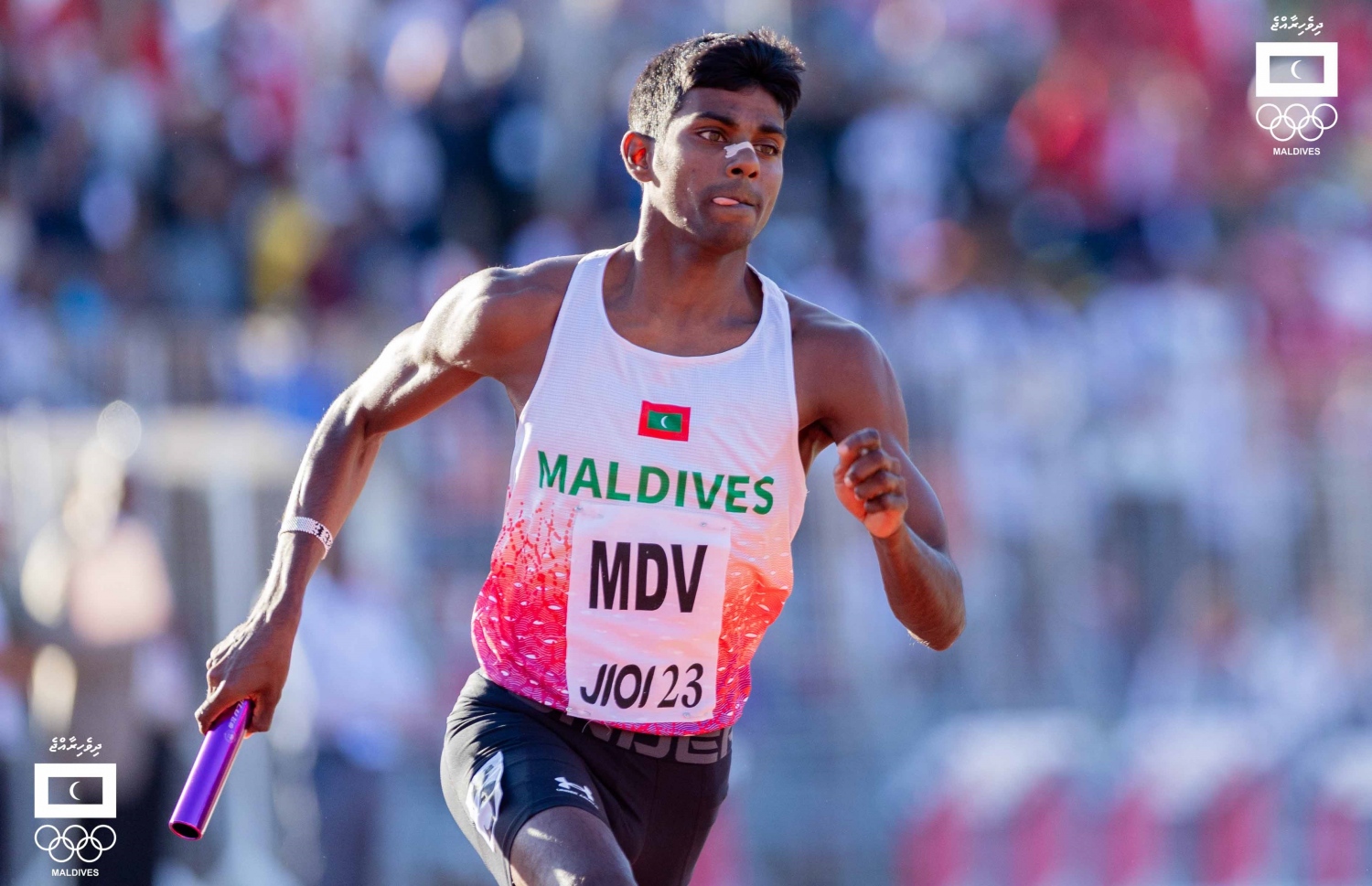 4 ގުނަ 400 މީޓަރު ފިރިހެނުންގެ ރިލޭ އިވެންޓުގައި ކުޑަ ރިޒާ ދުވަނީ.-- ފޮޓޯ: ސުއާދު އަބްދުއްސައްތާރު/ އެމްއޯސީ