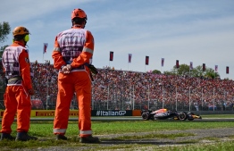 Red Bull Racing's Dutch driver Max Verstappen (R) drives during the Italian Formula One Grand Prix race at Autodromo Nazionale Monza circuit, in Monza on September 3, 2023.  -- Photo: Ben Stansall / AFP