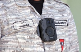 A corrections officer wears a body worn camera during a free trial to initiate using body-worn cameras by officers -- Photo: Corrections