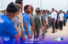 People of Dhangethi welcoming Nazim to their island