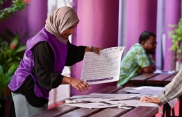 Officials busy at voting stations ahead of polling commencement on Saturday morning, September 9-- Photo: Nishan Ali | Mihaaru