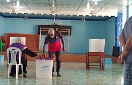 An elderly citizen casts his vote at Vaavu atoll Keyodhoo polling station-- Photo: Mihaaru Reader