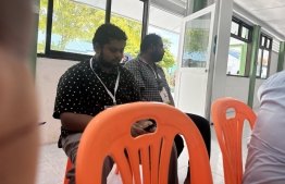Election officials and monitors at Himmafushi polling station-- Photo: Risheef | Mihaaru Reader