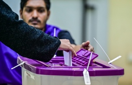 A voter casts their ballot during the first round of the presidential election held earlier in September-- Photo: Mihaaru