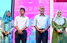 PPM/PNC coalition Presidential candidate Dr. Mohamed Muizzu and Running Mate Hussain Mohamed Latheef with their wives at the rally held to celebrate their win in Saturday's election. -- Photo: Fayaz Moosa