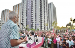 PPM/PNC coalition candidate Dr. Mohamed Muizzu speaks to the residents of Hiyaa Flats on Friday afternoon-- Photo: PPM