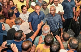 President Ibrahim Mohamed Solih greeting residents during his door-to-door campaign