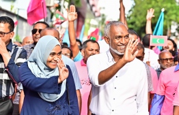 Presidential candidate for PPM/PNC Dr. Mohamed Muizzu and wife Sajidha, attending the coalitions Maldivians' Decision march to conclude the presidential campaign of Dr. Muizzu, ahead of the second round of the voting -- Photo: Nishan Ali / Mihaaru