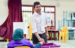 Progressive Party of Maldives (PPM) and People's National Congress (PNC) candidate Dr. Mohamed Muizzu's running mate Hussain Mohamed Latheef casting his vote -- Photo: Fayaz Moosa