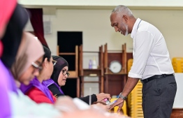 First round's victor and PPM/PNC coalition candidate Dr. Mohamed Muizzu at the polling station-- Photo: Fayaz Moosa